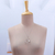 collar con colgante de perlas cultivadas - Collar con colgante floral abstracto de plata de ley con perla
