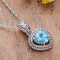 Blue topaz pendant necklace, 'Iridescent Heart'