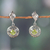 Rhodium-plated peridot dangle earrings, 'Green Swirl' - Rhodium-Plated Dangle Earrings with One-Carat Peridot Gems