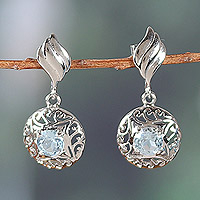 Rhodium-plated blue topaz dangle earrings, 'Celestial Swirl' - Rhodium-Plated Dangle Earrings with 1-Carat Blue Topaz Gems