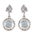 Rhodium-plated blue topaz dangle earrings, 'Celestial Swirl' - Rhodium-Plated Dangle Earrings with 1-Carat Blue Topaz Gems