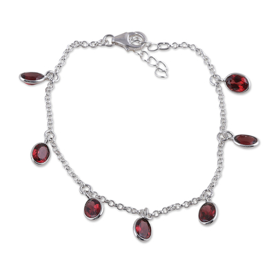 Garnet charm bracelet, 'Dancing Devotion' - Sterling Silver Charm Bracelet with 7-Carat Garnet Jewels