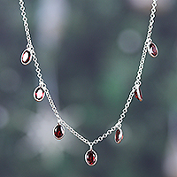 Garnet charm necklace, 'Dancing Devotion'