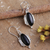 Onyx dangle earrings, 'Nocturnal Muse' - Polished Oval Onyx Cabochon Dangle Earrings from India