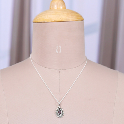 Garnet pendant necklace, 'Radiant Passion' - Peacock-Inspired Natural One-Carat Garnet Pendant Necklace