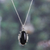 Onyx pendant necklace, 'Nocturnal Muse' - Polished Oval Onyx Cabochon Pendant Necklace from India