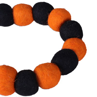 Wool felt garland, 'Halloween Flare' - Handcrafted Orange and Black Wool Felt Pompom Garland