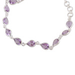 Amethyst link bracelet, 'Sagacity Rain' - 9-Carat Faceted Amethyst Link Bracelet Crafted in India