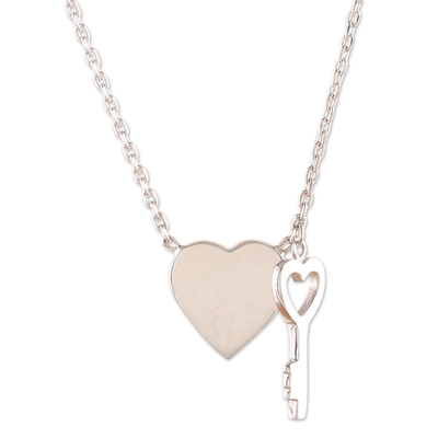 Sterling silver pendant necklace, 'Key to Your Love' - Heart and Key-Shaped Sterling Silver Pendant Necklace