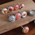 Ceramic knobs, 'Crimson Aura' (set of 8) - Set of 8 Nature-Inspired Hand-Painted Ceramic Knobs
