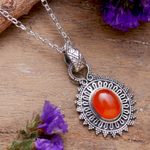 Carnelian pendant necklace, 'Soiree Charm' - Natural Carnelian and Sterling Silver Pendant Necklace