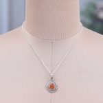 Carnelian pendant necklace, 'Soiree Charm' - Natural Carnelian and Sterling Silver Pendant Necklace