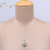 Sterling silver pendant necklace, 'Sun's Om' - Sun-Themed Om Sterling Silver Pendant Necklace from India