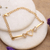 Gold-plated pendant bracelet, 'Radiant Hearts' - Heart-themed 22k Gold-Plated Cubic Zirconia Pendant Bracelet