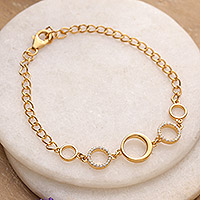 Gold-plated pendant bracelet, 'Gleaming Cycles' - Modern 22k Gold-Plated Cubic Zirconia Pendant Bracelet
