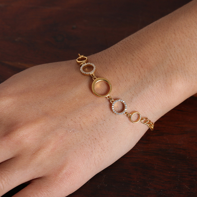 Gold-plated pendant bracelet, 'Gleaming Cycles' - Modern 22k Gold-Plated Cubic Zirconia Pendant Bracelet