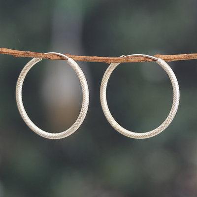 Sterling silver hoop earrings, 'Textured Radiance' - Textured Polished Sterling Silver Hoop Earrings from India