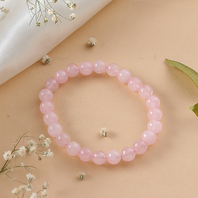 Rose quartz beaded stretch bracelet, 'Souls of Compassion' - Inspirational Natural Rose Quartz Beaded Stretch Bracelet