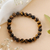 Tiger's eye beaded stretch bracelet, 'Souls of Courage' - Inspirational Round Tiger's Eye Beaded Stretch Bracelet