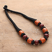 Wood beaded necklace, 'Tribal Unity' - Bohemian Brown Haldu Wood Beaded Necklace with Cotton Cord