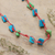 Halskette aus Baumwolle, 'Intrepid Magic' - Handgefertigte Halskette aus blauer und grüner Baumwolle