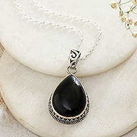 Onyx pendant necklace, 'Moonlit Brilliance' - Sterling Silver Pendant Necklace with Black Onyx Stone