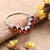 Garnet band ring, 'Scarlet Array' - High-Polished Faceted Two-Carat Garnet Band Ring