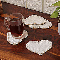 Glass beaded coasters, 'Graceful Love' (set of 4) - Set of 4 Handcrafted Heart-Shaped Glass Beaded Coasters