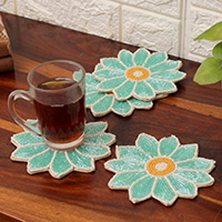 Glass beaded coasters, 'Lagoon Blooms' (set of 4) - Set of 4 Flower-Shaped Turquoise Glass Beaded Coasters