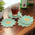 Glass beaded coasters, 'Lagoon Blooms' (set of 4) - Set of 4 Flower-Shaped Turquoise Glass Beaded Coasters