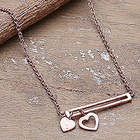 Rose gold-plated pendant necklace, 'Dancing Hearts' - Polished Heart-Themed 18k Rose Gold-Plated Pendant Necklace