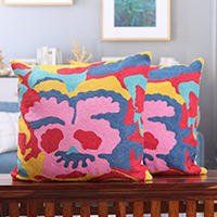 Cotton cushion covers, 'Comedic Facet' (pair) - Embroidered Whimsical Cotton Cushion Covers (Pair)