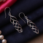 Sterling silver dangle earrings, 'Spiral Nest' - Openwork Textured Polished Sterling Silver Dangle Earrings