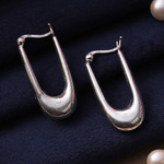 Sterling silver hoop earrings, 'Modern Radiance' - Classic Polished Sterling Silver Hoop Earrings from India