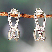 Sterling silver half-hoop earrings, 'Twisted Flair' - Modern Silver Half-Hoop Earrings with Twisted Design
