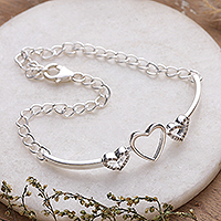 Cubic zirconia pendant bracelet, 'Shimmering Hearts' - Heart-Themed Cubic Zirconia Sterling Silver Pendant Bracelet