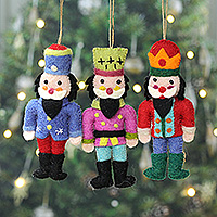 Wool ornaments, 'Festive Nutcrackers' - Set of 3 Nutcracker Theme Colorful Tree Ornaments from India