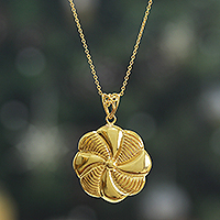 Brass pendant necklace, 'Glory of the Bloom' - High-Polished Floral Brass Pendant Necklace from India