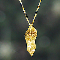 Brass pendant necklace, 'Autumnal Triumph' - High-Polished Leafy Brass Pendant Necklace from India