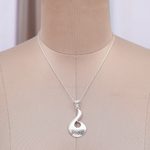 Silver-plated brass pendant necklace, 'Beaming Waves' - High-Polished Silver-Plated Brass Pangolin Pendant Necklace