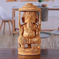 Wood sculpture, 'Sheltered by Grace' - Traditional Hand-Carved Kadam Wood Ganesha Sculpture