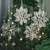 Paper ornaments, 'Enchanted Snowflakes' (set of 4) - Set of 4 Snowflake-Shaped Paper Christmas Ornaments