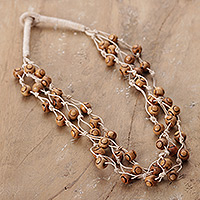 Wood beaded station necklace, 'Natural Essence' - Bohemian Handcrafted Haldu Wood and Cotton Station Necklace