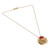 Onyx pendant necklace, 'Glowing Flame' - High-Polished Brass and Red Onyx Pendant Necklace