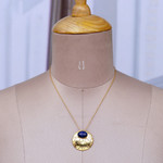 Lapis lazuli pendant necklace, 'Glowing Seer' - High-Polished Brass and Lapis Lazuli Pendant Necklace