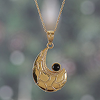 Onyx pendant necklace, 'Enigmatic Charmer' - Semi-Abstract Black Onyx Brass Pendant Necklace