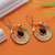 Onyx dangle earrings, 'Midnight Cradle' - High-Polished Semi-Abstract Black Onyx Dangle Earrings