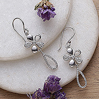 Rhodium-plated cubic zirconia dangle earrings, 'Gleaming Blossoms' - Floral-Themed Cubic Zirconia Sterling Silver Dangle Earrings