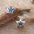 Sterling silver stud earrings, 'Blue Sparkly Star' - Hand-Painted Polished Silver Blue Star Stud Earrings