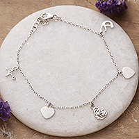 Sterling silver charm bracelet, 'Life with Love' - Heart-Themed Sterling Silver Charm Bracelet Crafted in India